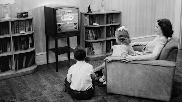 family_watching_tv_in_livingroom.jpg